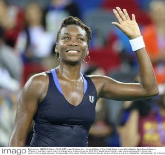 Venus Williams of the United States reacts after defeating Carla Suarez Navarro of Spain in their third-round match of the women s singles during the 2015 WTA Tennis Damen Wuhan Open tennis tournament in Wuhan city, central China s Hubei province, 30 September 2015. Venus Williams beat Carla Suarez Navarro of Spain 6-3, 6-4 on Wednesday (30 September 2015) to advance to the quarterfinals of the Wuhan Open. A day after earning her 700th victory, Williams hit five aces and saved three of four break points to dispatch the seventh-seeded Navarro in 1 hour, 29 minutes. Williams, who is a seven-time major champion and won her last Grand Slam title at Wimbledon in 2008, improved to 3-3 in her head-to-head against Navarro. She will next face the winner of the match between top-seeded Simona Halep and Johanna Konta being played later Wednesday. Venus Williams beats Navarro to advance at Wuhan Open  20150930_49419