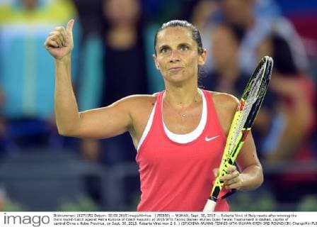 (150930) -- WUHAN, Sept. 30, 2015 -- Roberta Vinci of Italy reacts after winning the third round match against Petra Kvitova of Czech Republic at 2015 WTA Tennis Damen Wuhan Open Tennis Tournament in Wuhan, capital of central China s Hubei Province, on Sept. 30, 2015. Roberta Vinci won 2-0. ) (SP)CHINA-WUHAN-TENNIS-WTA-WUHAN OPEN-3RD ROUND(CN) ChengxMin 