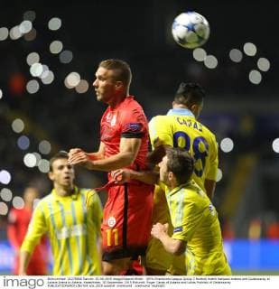 UEFA Champions League Group C football match between Astana and Galatasaray at Astana Arena in Astana, Kazakhstan, 30 September 2015 Pictured: Roger Canas of Astana and Lukas Podolski of Galatasaray 