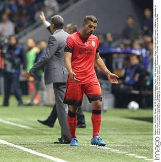 UEFA Champions League Group C football match between Astana and Galatasaray at Astana Arena in Astana, Kazakhstan, 30 September 2015 Final Score: Astana 2 - Galatasaray 2 Pictured: Coach Hamza Hamzaoglu and Lukas Podolski of Galatasaray 