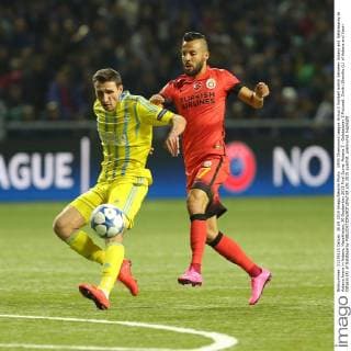 UEFA Champions League Group C football match between Astana and Galatasaray at Astana Arena in Astana, Kazakhstan, 30 September 2015 Final Score: Astana 2 - Galatasaray 2 Pictured: Dmitri Shomko (L) of Astana and Yasin Oztekin (R) of Galatasaray 