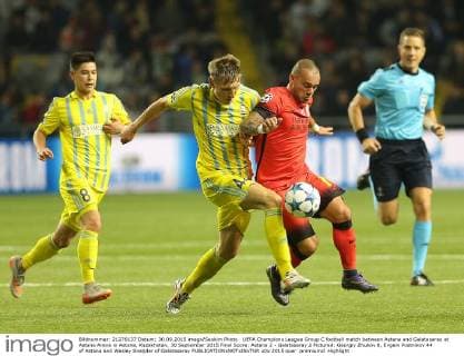 UEFA Champions League Group C football match between Astana and Galatasaray at Astana Arena in Astana, Kazakhstan, 30 September 2015 Final Score: Astana 2 - Galatasaray 2 Pictured: Georgiy Zhukov 8, Evgeni Postnikov 44 of Astana and Wesley Sneijder of Galatasaray 