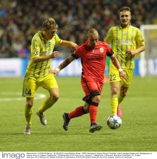 UEFA Champions League Group C football match between Astana and Galatasaray at Astana Arena in Astana, Kazakhstan, 30 September 2015 Final Score: Astana 2 - Galatasaray 2 Pictured: Baurzhan Dzholchiev 22, Evgeni Postnikov 44 of Astana and Wesley Sneijder of Galatasaray 