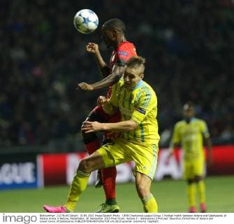 UEFA Champions League Group C football match between Astana and Galatasaray at Astana Arena in Astana, Kazakhstan, 30 September 2015 Final Score: Astana 2 - Galatasaray 2 Pictured: Baurzhan Dzholchiev of Astana and Lionel Carole of Galatasaray 