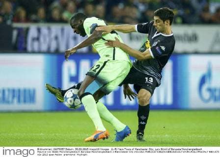 (L-R) Yaya Toure of Manchester City, Lars Stindl of Borussia Monchengladbach Maurice van Steen Monchengladbach Borussia Monchengladbach v Manchester City xVIxxIVx 4401875