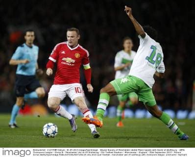 Wayne Rooney of Manchester United ManU tussles with Dante of Wolfsburg - UEFA Champions League - Group B - Manchester Utd vs Vfl Wolfsburg - Old Trafford Stadium - Manchester - England - 30th September 2015 - Picture Simon Bellis Sportimage EDITORIAL USE ONLY. No use with unauthorised audio, video, data, fixture lists, club league logos or live services. Online in-match use limited to 120 images, no video emulation. No use in betting, games or single club league player publications.