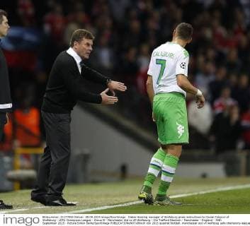 Dieter Hecking manager of Wolfsburg gives instructions to Daniel Caligiuri of Wolfsburg - UEFA Champions League - Group B - Manchester Utd vs Vfl Wolfsburg - Old Trafford Stadium - Manchester - England - 30th September 2015 - Picture Simon Bellis Sportimage EDITORIAL USE ONLY. No use with unauthorised audio, video, data, fixture lists, club league logos or live services. Online in-match use limited to 120 images, no video emulation. No use in betting, games or single club league player publications.