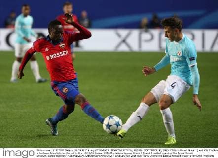 MOSCOW REGION, RUSSIA. SEPTEMBER 30, 2015. CSKA s Ahmed Musa (L) and PSV Eindhoven s Santiago Arias fight for the ball in their 2015 16 Season UEFA Champions League Group B Round 2 football match at the Arena Khimki Stadium. Sergei Bobylev TASS  TS00ECB0