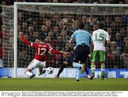 Chris Smalling of Manchester United ManU scores the second goal - UEFA Champions League - Group B - Manchester Utd vs Vfl Wolfsburg - Old Trafford Stadium - Manchester - England - 30th September 2015 - Picture Simon Bellis Sportimage EDITORIAL USE ONLY. No use with unauthorised audio, video, data, fixture lists, club league logos or live services. Online in-match use limited to 120 images, no video emulation. No use in betting, games or single club league player publications.