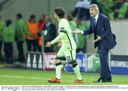 (L-R) David Silva of Manchester City, coach Manuel Pellegrini of Manchester City Maurice van Steen Monchengladbach Borussia Monchengladbach v Manchester City xVIxxIVx 4402246