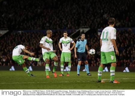 Sebastian Jung of Wolfsburg fires in a last minute free kick - UEFA Champions League - Group B - Manchester Utd vs Vfl Wolfsburg - Old Trafford Stadium - Manchester - England - 30th September 2015 - Picture Simon Bellis Sportimage EDITORIAL USE ONLY. No use with unauthorised audio, video, data, fixture lists, club league logos or live services. Online in-match use limited to 120 images, no video emulation. No use in betting, games or single club league player publications.