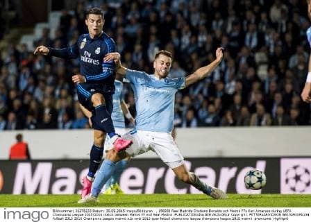, 150930 Real Madrids Cristiano Ronaldo och Malmö FFs Kari Arnarson during UEFA Champions League 2015 2016 match between Malmö FF and Real Madrid.  Copyright: PETTERxARVIDSON BB150930PA134