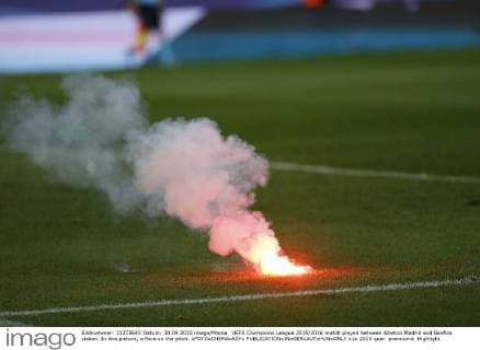 UEFA Champions League 2015 2016 match played between Atletico Madrid and Benfica Lisbon. In this picture, a flare on the pitch. xFOTOxCHEMAxREYx 
