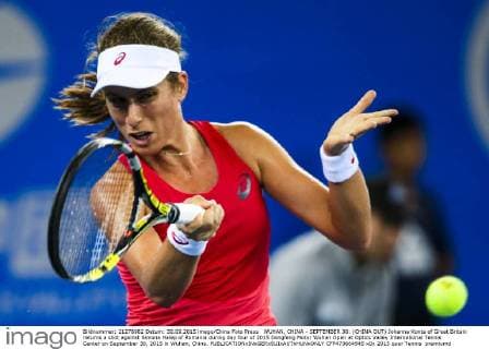 WUHAN, CHINA - SEPTEMBER 30: (CHINA OUT) Johanna Konta of Great Britain returns a shot against Simona Halep of Romania during day four of 2015 Dongfeng Motor Wuhan Open at Optics Valley International Tennis Center on September 30, 2015 in Wuhan, China.  CFP473664945 