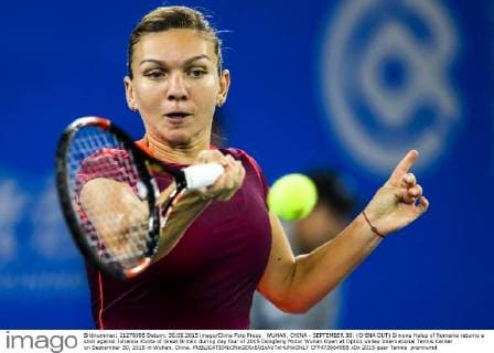 WUHAN, CHINA - SEPTEMBER 30: (CHINA OUT) Simona Halep of Romania returns a shot against Johanna Konta of Great Britain during day four of 2015 Dongfeng Motor Wuhan Open at Optics Valley International Tennis Center on September 30, 2015 in Wuhan, China.  CFP473664958 