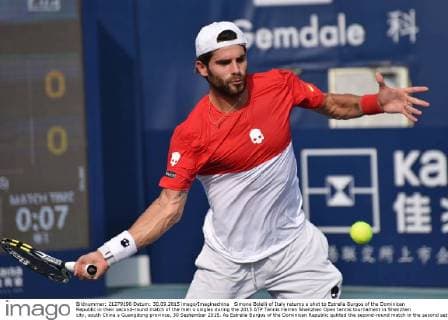 Simone Bolelli of Italy returns a shot to Estrella Burgos of the Dominican Republic in their second-round match of the men s singles during the 2015 ATP Tennis Herren Shenzhen Open tennis tournament in Shenzhen city, south China s Guangdong province, 30 September 2015. As Estrella Burgos of the Dominican Republic quitted the second-round match in the second set due to his injury, Simone Bolelli of Italy advanced to the third round match of the men s singles during the 2015 ATP Shenzhen Open tennis tournament in Shenzhen city, south China s Guangdong province, 30 September 2015. Simone Bolelli advances to third round at ATP Shenzhen Open  pbu339051_07