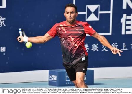 Estrella Burgos of the Dominican Republic returns a shot to Simone Bolelli of Italy in their second-round match of the men s singles during the 2015 ATP Tennis Herren Shenzhen Open tennis tournament in Shenzhen city, south China s Guangdong province, 30 September 2015. As Estrella Burgos of the Dominican Republic quitted the second-round match in the second set due to his injury, Simone Bolelli of Italy advanced to the third round match of the men s singles during the 2015 ATP Shenzhen Open tennis tournament in Shenzhen city, south China s Guangdong province, 30 September 2015. Simone Bolelli advances to third round at ATP Shenzhen Open  pbu339051_13