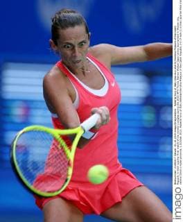 Roberta Vinci of Italy returns a shot to Karolina Pliskova of the Czech Republic in their quarter-final match of the women s singles during the 2015 WTA Tennis Damen Wuhan Open tennis tournament in Wuhan city, central China s Hubei province, 1 October 2015. Roberta Vinci of Italy defeated Karolina Pliskova of the Czech Republic 2-0 (7-6 6-3) in their quarter-final match of the women s singles during the 2015 WTA Wuhan Open tennis tournament in Wuhan city, central China s Hubei province, 1 October 2015. Roberta Vinci defeats Karolina Pliskova at Wuhan Open  20151001_09088
