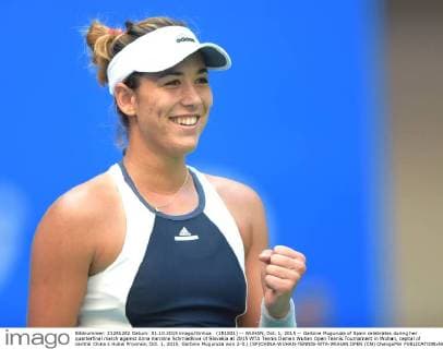 (151001) -- WUHAN, Oct. 1, 2015 -- Garbine Muguruza of Spain celebrates during her quarterfinal match against Anna Karolina Schmiedlova of Slovakia at 2015 WTA Tennis Damen Wuhan Open Tennis Tournament in Wuhan, capital of central China s Hubei Province, Oct. 1, 2015. Garbine Muguruza won 2-0.) (SP)CHINA-WUHAN-TENNIS-WTA-WUHAN OPEN (CN) ChengxMin 