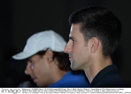 Oct. 1, 2015 - Bangko, Thailand - Novak Djokovic (R) of Serbia looks on as Rafael Nadal of Spain speaks during a press conference PK Pressekonferenz at a hotel in Bangkok, Thailand on October 1, 2015. Nadal and Djokovic will play in an exhibition match at the Indoor Stadium Huamark on October 2. Nadal v Djokovic in Thailand  - ZUMAn230