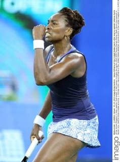 Venus Williams of the United States reacts after scoring against Johanna Konta of the United Kingdom in their quarter-final match of the women s singles during the 2015 WTA Tennis Damen Wuhan Open tennis tournament in Wuhan city, central China s Hubei province, 1 October 2015. Venus Williams of the United States defeated Johanna Konta of the United Kingdom 2-1 (6-4 3-6 7-5) in their quarter-final match of the women s singles during the 2015 WTA Wuhan Open tennis tournament in Wuhan city, central China s Hubei province, on Thursday (1 October 2015). Venus Williams ousts Johanna Konta to advance semi-final at Wuhan Open  20151001_68117
