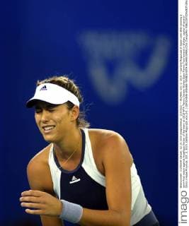 (151002) -- WUHAN, Oct. 2, 2015 -- Garbine Muguruza of Spain cries after winning a semi-final match against Angelique Kerber of Germany at 2015 WTA Tennis Damen Wuhan Open Tennis Tournament in Wuhan, capital of central China s Hubei Province, Oct. 2, 2015. Garbine Muguruza won 2-0. ) (SP)CHINA-WUHAN-TENNIS-WTA-WUHAN OPEN (CN) ChengxMin 