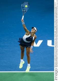WUHAN, CHINA - OCTOBER 02: (CHINA OUT) Garbine Muguruza of Spain returns a shot against Angelique Kerber of Russia in semi-final match during day six of 2015 Dongfeng Motor Wuhan Open at Optics Valley International Tennis Center on October 2, 2015 in Wuhan, Hubei Province of China.  CFP473769735 