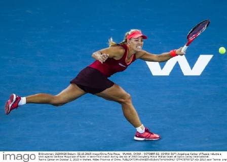 WUHAN, CHINA - OCTOBER 02: (CHINA OUT) Angelique Kerber of Russia returns a shot against Garbine Muguruza of Spain in semi-final match during day six of 2015 Dongfeng Motor Wuhan Open at Optics Valley International Tennis Center on October 2, 2015 in Wuhan, Hubei Province of China.  CFP473769727 