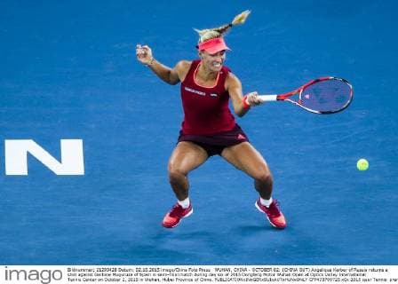WUHAN, CHINA - OCTOBER 02: (CHINA OUT) Angelique Kerber of Russia returns a shot against Garbine Muguruza of Spain in semi-final match during day six of 2015 Dongfeng Motor Wuhan Open at Optics Valley International Tennis Center on October 2, 2015 in Wuhan, Hubei Province of China.  CFP473769725 