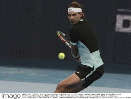 Oct. 2, 2015 - Bangkok, thailand - Tennis player Rafael Nadal of Spain returns the ball against Novak Djokovic of Serbia during the exhibition match at the Indoor Stadium Huamark in Bangkok, Thailand on October 2, 2015. Djokovic wins 2-0 set, score 6-4, 6-2. Nadal v Djokovic Exhibition Match in Bangkok  - ZUMAn230