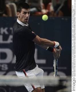Oct. 2, 2015 - Bangkok, thailand - Tennis player Novak Djokovic of Serbia returns the ball against Rafael Nadal of Spain during the exhibition match at the Indoor Stadium Huamark in Bangkok, Thailand on October 2, 2015. Djokovic wins 2-0 set, score 6-4, 6-2. Nadal v Djokovic Exhibition Match in Bangkok  - ZUMAn230