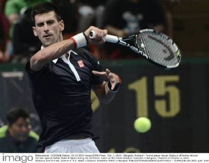 Oct. 2, 2015 - Bangkok, thailand - Tennis player Novak Djokovic of Serbia returns the ball against Rafael Nadal of Spain during the exhibition match at the Indoor Stadium Huamark in Bangkok, Thailand on October 2, 2015. Djokovic wins 2-0 set, score 6-4, 6-2. Nadal v Djokovic Exhibition Match in Bangkok  - ZUMAn230
