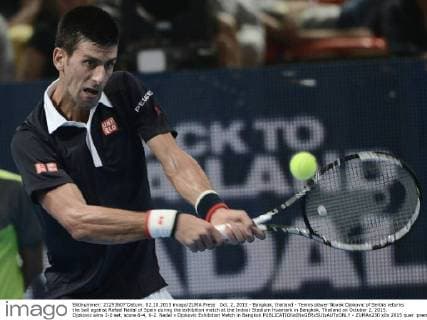 Oct. 2, 2015 - Bangkok, thailand - Tennis player Novak Djokovic of Serbia returns the ball against Rafael Nadal of Spain during the exhibition match at the Indoor Stadium Huamark in Bangkok, Thailand on October 2, 2015. Djokovic wins 2-0 set, score 6-4, 6-2. Nadal v Djokovic Exhibition Match in Bangkok  - ZUMAn230