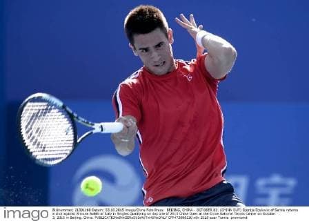 BEIJING, CHINA - OCTOBER 03: (CHINA OUT) Djordje Djokovic of Serbia returns a shot against Simone Bolelli of Italy in Singles Qualifying on day one of 2015 China Open at the China National Tennis Center on October 3, 2015 in Beijing, China.  CFP473800210 