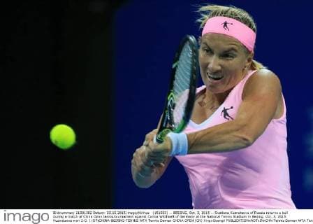(151003) -- BEIJING, Oct. 3, 2015 -- Svetlana Kuznetsova of Russia returns a ball during a match of China Open tennis tournament against Carina Witthoeft of Germany at the National Tennis Stadium in Beijing, Oct. 3, 2015. Kuznetsova won 2-0. ) (SP)CHINA-BEIJING-TENNIS WTA Tennis Damen CHINA OPEN (CN) XingxGuangli 