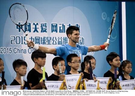 BEIJING, CHINA - OCTOBER 03: (CHINA OUT) Novak Djokovic of Serbia takes part in a charity promotion on day one of the 2015 China Open at the China National Tennis Centre on October 3, 2015 in Beijing, China.  CFP473807853 