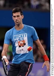 BEIJING, CHINA - OCTOBER 03: (CHINA OUT) Novak Djokovic of Serbia takes part in a charity promotion on day one of the 2015 China Open at the China National Tennis Centre on October 3, 2015 in Beijing, China.  CFP473809517 