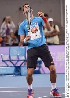 BEIJING, CHINA - OCTOBER 03: (CHINA OUT) Novak Djokovic of Serbia takes part in a charity promotion on day one of the 2015 China Open at the China National Tennis Centre on October 3, 2015 in Beijing, China.  CFP473809521 