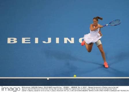 (151004) -- BEIJING, Oct. 4, 2015 -- Bojana Jovanovski of Serbia returns the ball against Caroline Wozniacki of Denmark during their women s singles first round match of China Open Tennis Tournament at National Tennis Center in Beijing, capital of China on Oct. 4, 2015. Wozniacki won 2-0. )(wll) (SP)CHINA-BEIJING-TENNIS-CHINA OPEN-WOMEN S SINGLES-1ST ROUND(CN) XingxGuangli 
