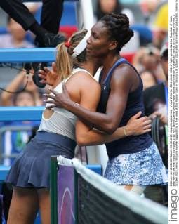 Venus Williams of the United States, right, greets Garbine Muguruza of Spain after winnig the final match during the 2015 WTA Tennis Damen Wuhan Open tennis tournament in Wuhan city, central China s Hubei province, 3 October 2015. Venus Williams won her biggest title in five years at the Wuhan Open on Saturday (3 October 2015) after Garbine Muguruza quitted, making her the fifth player to pull out mid-match in the late-season tournament. Williams took the first set and was three games up in the second when the Spaniard stopped play at 53 minutes, handing the American veteran the 47th title win of her career, and her first victory at a WTA Premier Five event since she beat Victoria Azarenka in 2010 in Dubai. Wimbledon finalist Muguruza, ranked world number eight, 16 places ahead of American veteran Williams, had a tough semi-final against Germany s Angelique Kerber, winning in straight sets but falling during the closing tie break and injuring her ankle. But the 21-year-old said it was exhaustion not injury that made her pull out. Venus wins 47th career title as Muguruza quits Wuhan Open final  20151003_49213