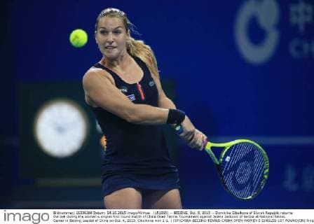 (151005) -- BEIJING, Oct. 5, 2015 -- Dominika Cibulkova of Slovak Republic returns the ball during the women s singles first round match of China Open Tennis Tournament against Jelena Jankovic of Serbia at National Tennis Center in Beijing, capital of China on Oct. 4, 2015. Cibulkova won 2-1. ) (SP)CHINA-BEIJING-TENNIS-CHINA OPEN-WOMEN S SINGLES-1ST ROUND(CN) XingxGuangli 