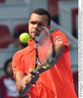 (151005) -- BEIJING, Oct. 5, 2015 -- Jo-Wilfried Tsonga of France returns the shot during his men s singles first round match of China Open Tennis Tournament against Andreas Haider-Maurer of Austria at National Tennis Center in Beijing, capital of China on Oct. 5, 2015. Haider-Maurer won 2-0. ) (SP)CHINA-BEIJING-TENNIS-CHINA OPEN-MEN S SINGLES-1ST ROUND(CN) LixWen 