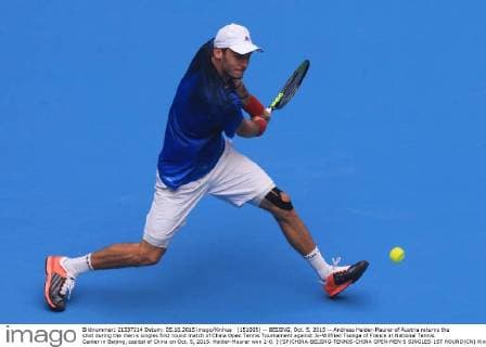 (151005) -- BEIJING, Oct. 5, 2015 -- Andreas Haider-Maurer of Austria returns the shot during the men s singles first round match of China Open Tennis Tournament against Jo-Wilfried Tsonga of France at National Tennis Center in Beijing, capital of China on Oct. 5, 2015. Haider-Maurer won 2-0. ) (SP)CHINA-BEIJING-TENNIS-CHINA OPEN-MEN S SINGLES-1ST ROUND(CN) XingxGuangli 