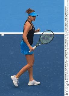 (151005) -- BEIJING, Oct. 5, 2015 -- Belinda Bencic of Switzerland reacts during the women s singles first round match of China Open Tennis Tournament against Madison Brengle of the United States at National Tennis Center in Beijing, capital of China on Oct. 5, 2015. Bencic won 2-1. ) (SP)CHINA-BEIJING-TENNIS-CHINA OPEN-WOMEN S SINGLES-1ST ROUND(CN) XingxGuangli 