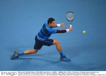 (151005) -- BEIJING, Oct. 5, 2015 -- Milos Raonic of Canada returns the shot during the men s singles first round match of China Open Tennis Tournament against Viktor Troicki of Serbia at National Tennis Center in Beijing, capital of China on Oct. 5, 2015. Raonic lost 0-2. ) (SP)CHINA-BEIJING-TENNIS-CHINA OPEN-MEN S SINGLES-1ST ROUND(CN) XingxGuangli 