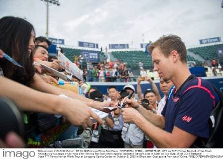 SHENZHEN, CHINA - OCTOBER 05: (CHINA OUT) Tomas Berdych of the Czech Republic signs autographs for fans after winning the final match against Guillermo Garcia-Lopez of Spain on day eight of the 2015 Shenzhen Open ATP Tennis Herren World Tour at Longgang Sports Center on October 5, 2015 in Shenzhen, Guangdong Province of China.  CFP473919959 
