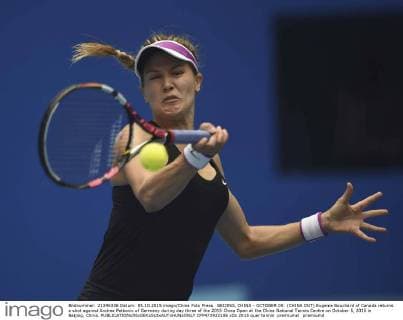 BEIJING, CHINA - OCTOBER 05: (CHINA OUT) Eugenie Bouchard of Canada returns a shot against Andrea Petkovic of Germany during day three of the 2015 China Open at the China National Tennis Centre on October 5, 2015 in Beijing, China.  CFP473922186 
