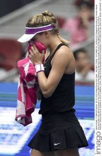 BEIJING, CHINA - OCTOBER 05: (CHINA OUT) Eugenie Bouchard of Canada leaves the court after she retires injured in her match against Andrea Petkovic of Germany during day three of the 2015 China Open at the China National Tennis Centre on October 5, 2015 in Beijing, China.  CFP473922189 
