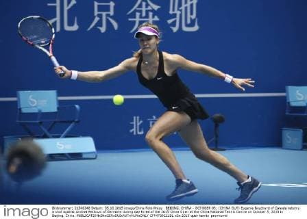 BEIJING, CHINA - OCTOBER 05: (CHINA OUT) Eugenie Bouchard of Canada returns a shot against Andrea Petkovic of Germany during day three of the 2015 China Open at the China National Tennis Centre on October 5, 2015 in Beijing, China.  CFP473922191 