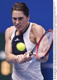 BEIJING, CHINA - OCTOBER 05: (CHINA OUT) Andrea Petkovic of Germany returns a shot against Eugenie Bouchard of Canada during day three of the 2015 China Open at the China National Tennis Centre on October 5, 2015 in Beijing, China.  CFP473922197 